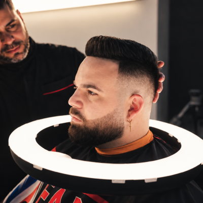 Professional skin fade haircut and beard trim by Hugo The Cuban Barber in Panama City, Florida